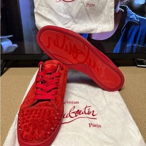Red on red Christian Louboutin sneakers for men!!
